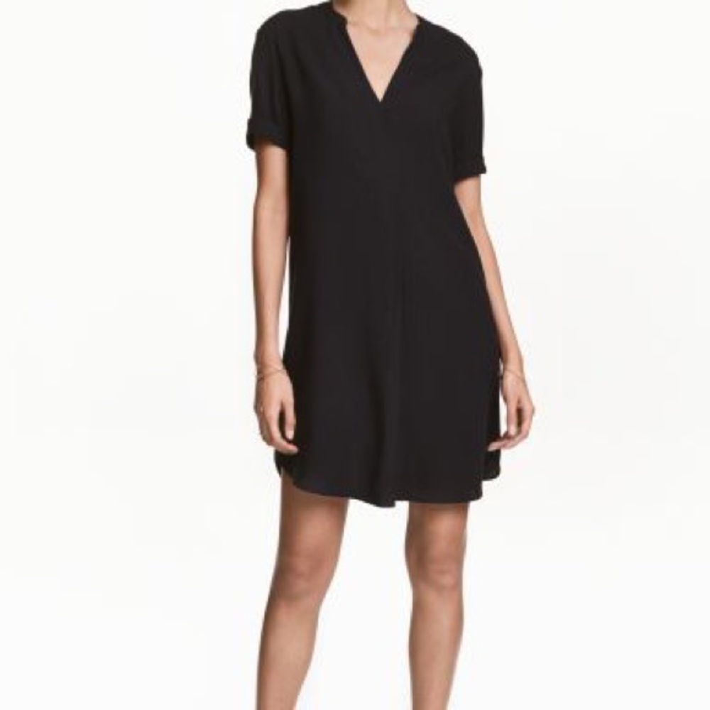 Black waist cinch short sleeve size 8 mini dress